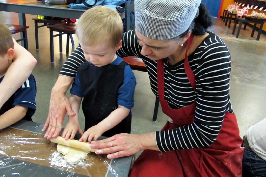 Katia Mayo, owner of Pamola Bakery, demonstrates rolling pin technique