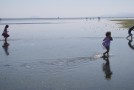 playing at the beach